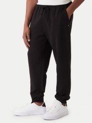 Tommy Hilfiger Spodnie dresowe Essential MW0MW37236 Czarny Regular Fit. Czarne spodnie sportowe męskie Tommy Hilfiger, m, bez wzorów, z bawełny. Za 469.99 zł.