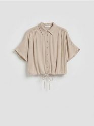 Wiskozowa koszula z wiązaniem - beżowy. Brązowe koszule damskie Reserved, l, bez wzorów, z wiskozy, bez kołnierzyka, bez ramiączek. Za 79.99 zł.