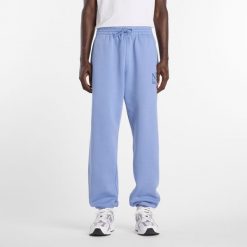 Spodnie męskie New Balance MB61E74AAA3 – niebieskie. Niebieskie spodnie sportowe męskie New Balance, m, bez wzorów, z bawełny. Za 279.99 zł.