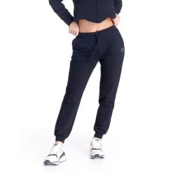 Damskie spodnie dresowe z mankietami Basic. Czarne spodnie dresowe damskie LEONE 1947 APPAREL, bez wzorów, z dresówki, sportowe, na fitness i siłownię. Za 218.92 zł.