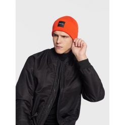 Czapka Calvin Klein. Brązowe czapki męskie Calvin Klein, na zimę, bez wzorów. Za 229.99 zł.