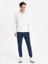 Spodnie męskie dresowe CARROT ze strukturalnej dzianiny - ciemnoniebieskie V5 - Rozmiar: XXL. Niebieskie spodnie sportowe męskie Ombre Clothing, m, bez wzorów, z bawełny. W wyprzedaży za 59.99 zł.