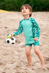 DucKsday Koszulka plażowo-kąpielowa unisex, filtr UPF 50+, rozmiar 1-2 lata (80-86). Kąpielówki męskie DucKsday, bez wzorów. Za 67.50 zł.