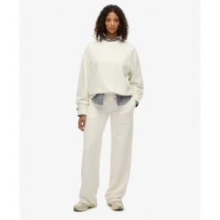 Bluza damska Superdry Studios. Białe bluzy damskie Superdry, bez wzorów, bez ramiączek, bez kaptura. Za 288.40 zł.