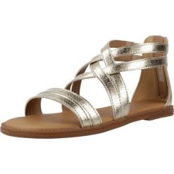 Sandały GEOX J SANDAL KARLY Złoty. Żółte sandały damskie Geox, bez wzorów, z syntetyku, bez obcasa, bez zapięcia. Za 235.99 zł.
