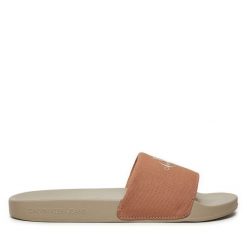 Klapki Calvin Klein Jeans. Czerwone klapki damskie Calvin Klein Jeans, bez wzorów, z jeansu, bez obcasa, bez zapięcia. Za 179.99 zł.