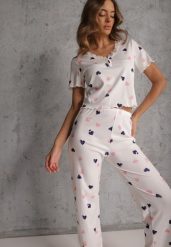 Biały Elastyczny Komplet Piżamowy w Serduszka Spodnie i Top Isle. Białe piżamy damskie Renee, bez wzorów, z materiału, bez ramiączek. Za 79.99 zł.