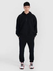 4F Spodnie dresowe joggery męskie - czarne M. Czarne spodnie materiałowe męskie 4F, bez wzorów, z bawełny. W wyprzedaży za 89.99 zł.