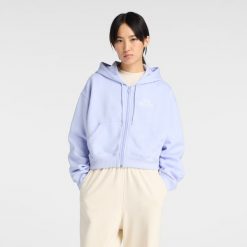 Bluza damska New Balance WJ61W2EEDYK – fioletowa. Fioletowe bluzy damskie New Balance, s, bez wzorów, z bawełny, klasyczne, bez ramiączek, z kapturem. Za 299.99 zł.