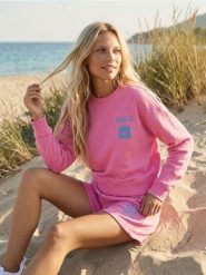 Bluza z napisem Make You Smile - różowy. Czerwone bluzy damskie Sinsay, l, bez wzorów, bez ramiączek, bez kaptura. Za 39.99 zł.