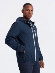 Lekka sportowa kurtka męska z polarową podszewką – granatowa V2 OM-JANP-0136 - XXL. Niebieskie kurtki sportowe męskie Ombre Clothing, l, z aplikacjami, z gumy, żeglarskie. W wyprzedaży za 189.99 zł.