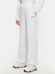 Tommy Hilfiger Spodnie dresowe UW0UW05577 Biały Relaxed Fit. Białe spodnie dresowe damskie Tommy Hilfiger, bez wzorów, z bawełny. Za 159.99 zł.