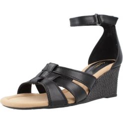 Sandały CLARKS KYARRA JOY Czarny. Czarne sandały damskie Clarks, bez wzorów, ze skóry, bez obcasa, bez zapięcia. Za 194.99 zł.