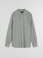 Bawełniana koszula z długim rękawem i kieszenią piersiową - zielony. Zielone koszule męskie Sinsay, l, bez wzorów, z bawełny, bez kołnierzyka, bez ramiączek. Za 59.99 zł.