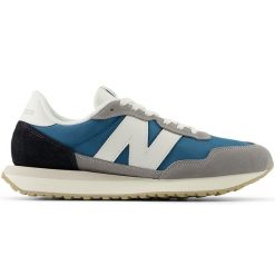 Buty męskie New Balance MS237RTG – multikolor. Buty sportowe męskie New Balance, bez wzorów, z gumy, bez zapięcia. Za 199.99 zł.