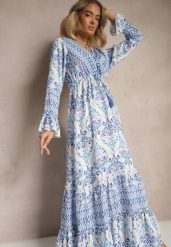 Niebieska Sukienka z Wiskozą o Rozkloszowanym Kroju z Falbanami w Etniczny Print Korimira. Niebieskie sukienki damskie Renee, na co dzień, l, bez wzorów, z wiskozy, eleganckie, bez kołnierzyka, bez ramiączek, maxi, kopertowe. Za 119.99 zł.