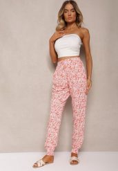 Pomarańczowe Wiskozowe Spodnie w Kwiaty z Gumką w Pasie Rivabele. Brązowe spodnie materiałowe damskie Renee, bez wzorów, z jeansu, eleganckie. Za 24.99 zł.