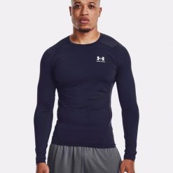 Koszulka fitness męska Under Armour HG Armour Comp z długim rękawem. Niebieskie bluzy męskie Under Armour, l, bez wzorów, sportowe, bez ramiączek, bez kaptura. Za 129.99 zł.