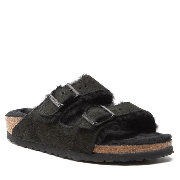 Klapki Birkenstock. Czarne klapki damskie Birkenstock, bez wzorów, bez obcasa, bez zapięcia. Za 549.99 zł.