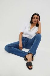 Jeansy typu flare. Jeansy damskie MOODO, bez wzorów, z bawełny. W wyprzedaży za 41.99 zł.