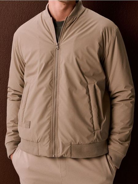 Kurtka bomberka - beżowy. Brązowe kurtki męskie Sinsay, l, bez wzorów, bez kaptura. Za 89.99 zł.