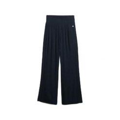 Damskie spodnie plażowe Superdry. Niebieskie spodnie dresowe damskie Superdry, na lato, bez wzorów, eleganckie, długie. Za 325.15 zł.
