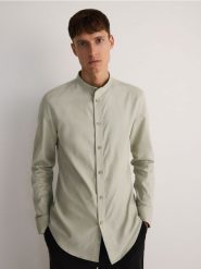 Koszula slim z bawełny oxford - jasnozielony. Zielone koszule męskie Reserved, l, bez wzorów, z bawełny, bez kołnierzyka, bez ramiączek. W wyprzedaży za 39.99 zł.