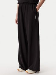 Tommy Jeans Spodnie dresowe DW0DW22951 Czarny Relaxed Fit. Czarne spodnie dresowe damskie Tommy Jeans, bez wzorów, z bawełny. Za 369.99 zł.