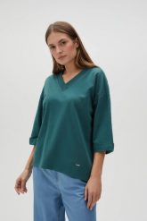Bluza oversize z dekoltem w serek zielona. Zielone bluzy damskie MOODO, l, bez wzorów, z bawełny, bez ramiączek, bez kaptura. Za 79.99 zł.