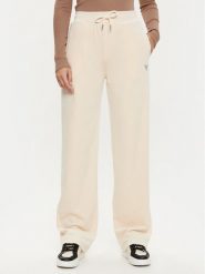 Guess Spodnie dresowe V3BB26 KBXI2 Écru Regular Fit. Spodnie dresowe damskie Guess, z aplikacjami, z dresówki. Za 189.99 zł.