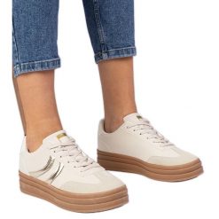 Beżowe sneakersy trampki damskie z złotym dodatkiem beżowy. Brązowe trampki i tenisówki damskie bez wzorów, z syntetyku, bez zapięcia. Za 96.19 zł.