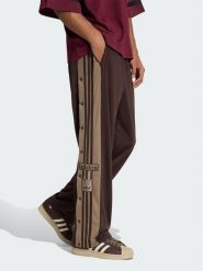 Adidas Spodnie dresowe Adibreak Classic KS7398 Brązowy ciemny Regular Fit. Brązowe spodnie sportowe męskie Adidas, m, bez wzorów, z dresówki. Za 328.99 zł.