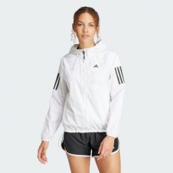 Kurtka Own The Run. Czarne kurtki sportowe damskie Adidas, xs, bez wzorów, z materiału, bez ramiączek, bez kaptura, do biegania. Za 329.00 zł.