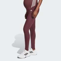 Legginsy Optime Essentials Full-Length (Maternity). Brązowe legginsy damskie Adidas, bez wzorów, z materiału. W wyprzedaży za 175.25 zł.
