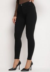 Czarne Dopasowane Jeansy z Bawełną Push Up z Wysokim Stanem Torsha. Czarne jeansy damskie Born2be, bez wzorów, z bawełny, eleganckie, z podwyższonym stanem. Za 64.99 zł.