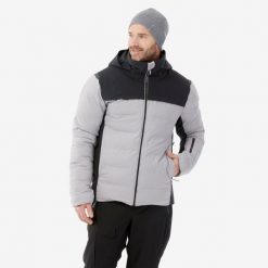Kurtka narciarska męska Quechua 500 Warm. Niebieskie kurtki sportowe męskie WED'ZE, na zimę, m, bez wzorów, z włókna, bez kaptura, narciarskie. Za 499.99 zł.