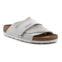 Klapki damskie Birkenstock Kyoto. Szare klapki damskie Birkenstock, bez wzorów, z materiału, bez obcasa, bez zapięcia. Za 751.55 zł.