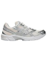 Damskie tenisówki Asics. Białe trampki i tenisówki damskie Asics, bez wzorów, z materiału, bez zapięcia. Za 474.55 zł.