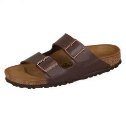 Klapki damskie Birkenstock Arizona Dunkelbraun Birkoflor. Brązowe klapki damskie Birkenstock, bez wzorów, z materiału, sportowe, bez obcasa, bez zapięcia. Za 349.00 zł.