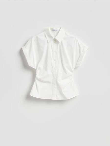 Taliowana koszula - biały. Białe koszule damskie Reserved, l, bez wzorów, z bawełny, bez kołnierzyka, bez ramiączek. W wyprzedaży za 45.99 zł.