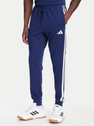Adidas Spodnie dresowe Essential 3-Stripes JD1878 Niebieski Regular Fit. Niebieskie spodnie sportowe męskie Adidas, l, bez wzorów, z dresówki. Za 159.99 zł.