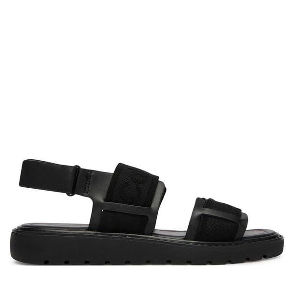 Sandały Calvin Klein. Czarne sandały damskie Calvin Klein, bez wzorów, bez obcasa, na płaskiej podeszwie, bez zapięcia. Za 237.99 zł.