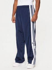Adidas Spodnie dresowe Adibreak JD4268 Granatowy Loose Fit. Niebieskie spodnie sportowe męskie Adidas, m, bez wzorów, z dresówki. Za 329.99 zł.