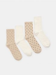 Skarpetki z bawełną 4 pack - kremowy. Białe skarpetki damskie Sinsay, bez wzorów, z bawełny. Za 15.99 zł.