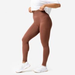 Legginsy fitness damskie Domyos Push Up. Brązowe legginsy damskie DOMYOS, bez wzorów, z elastanu. Za 129.99 zł.