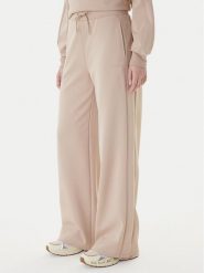 Guess Spodnie dresowe V5BB12 KCX22 Beżowy Regular Fit. Brązowe spodnie dresowe damskie Guess, z aplikacjami, z dresówki. Za 479.99 zł.