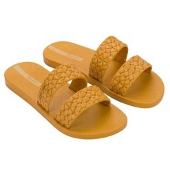 Klapki basenowe damskie Ipanema Renda II. Żółte klapki damskie Ipanema, na lato, bez wzorów, z jeansu, eleganckie, bez obcasa, bez zapięcia. Za 55.99 zł.