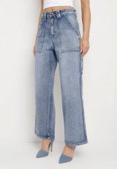 Jasnoniebieskie Jeansy z Szerokimi Nogawkami i Wysokim Stanem Asphira. Niebieskie jeansy damskie Born2be, bez wzorów, z denimu, retro, z podwyższonym stanem. Za 119.99 zł.