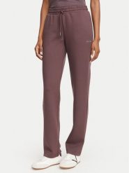 Guess Spodnie dresowe V6YB25 K4803 Brązowy Regular Fit. Brązowe spodnie dresowe damskie Guess, z aplikacjami, z dresówki. Za 344.99 zł.