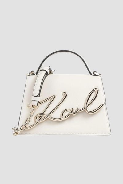 KARL LAGERFELD Biała mała skórzana torebka K/Signature 2.0. Białe torebki do ręki damskie KARL LAGERFELD, bez wzorów, ze skóry, małe, bez dodatków. W wyprzedaży za 1,069.99 zł.